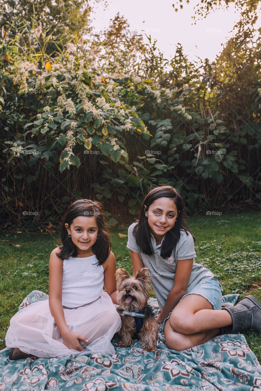 Sisters and a puppy