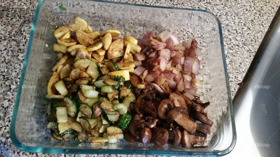 I love Vegan.  sauteed red onion, zucchini, yellow squash, baby portabella mushrooms