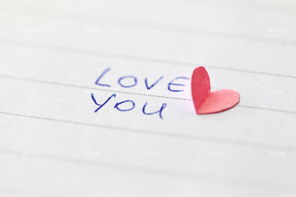 Handwritten phrase 'Love you'