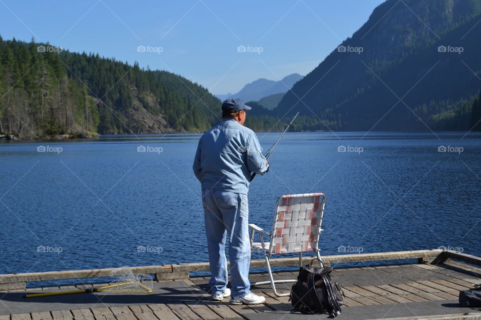 Fishing the lake early morning. Fishing the lake off the dock 