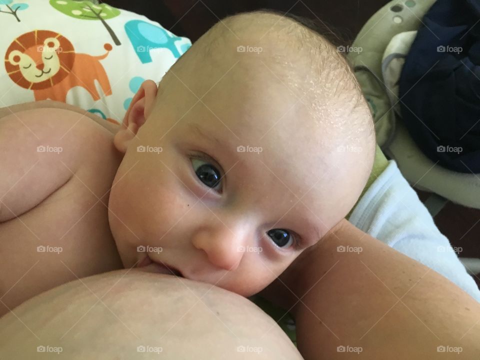 Close-up of breastfeeding baby
