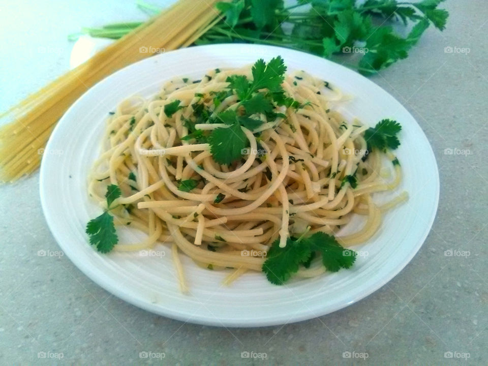 Close-up of pasta with coriander