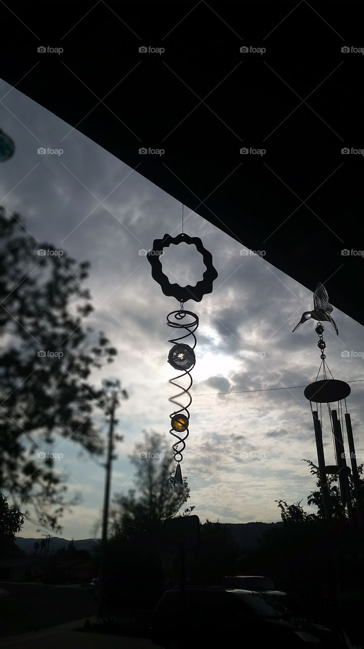 wind chimes. view from my porch on a pretty day