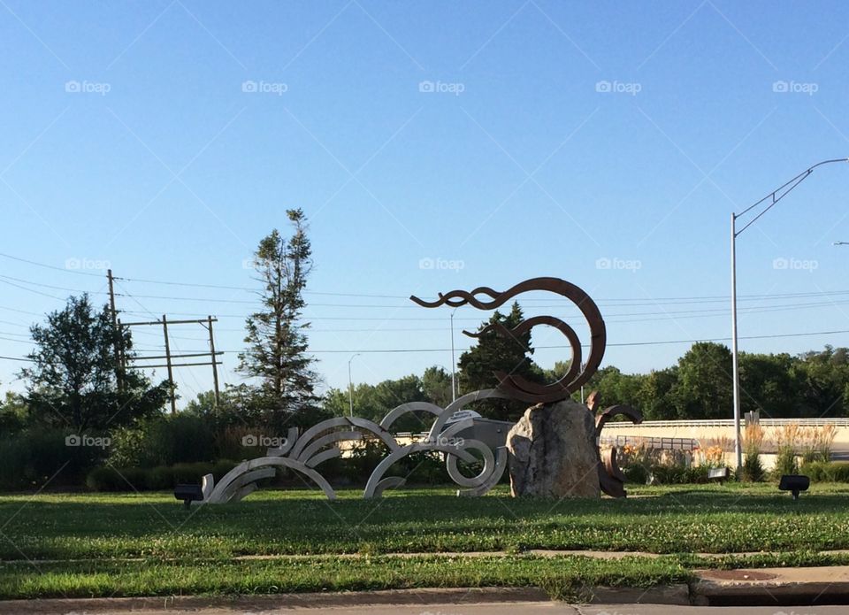 Artwork sculpture "Epic" located at Olsens Riverside Park in Cedar Falls, Iowa. 
