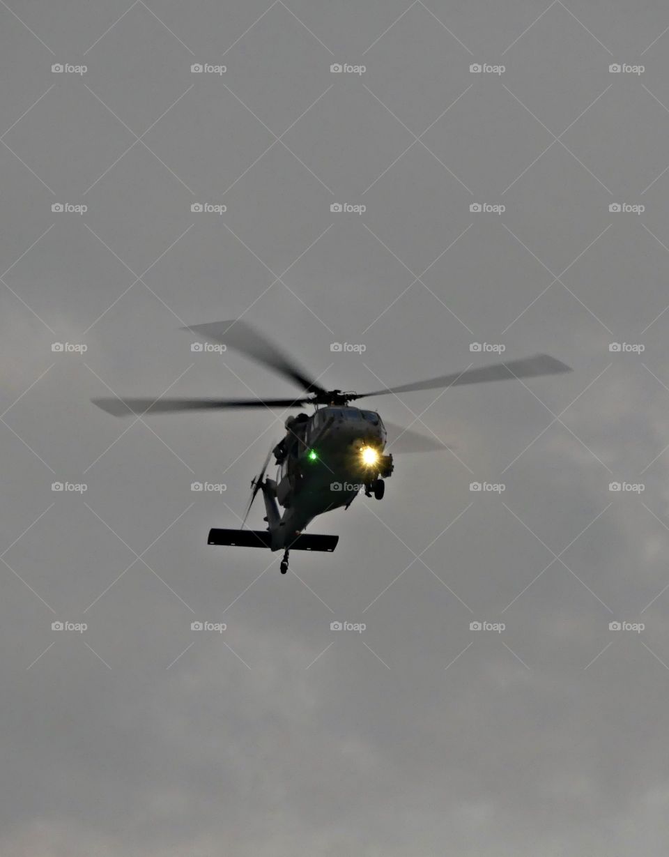 In motion A search and rescue helicopter on a mission. Lights on - For me, motion in photography is captured through longer shutter speeds which record movement, a moment, or emotion expressed through abstraction