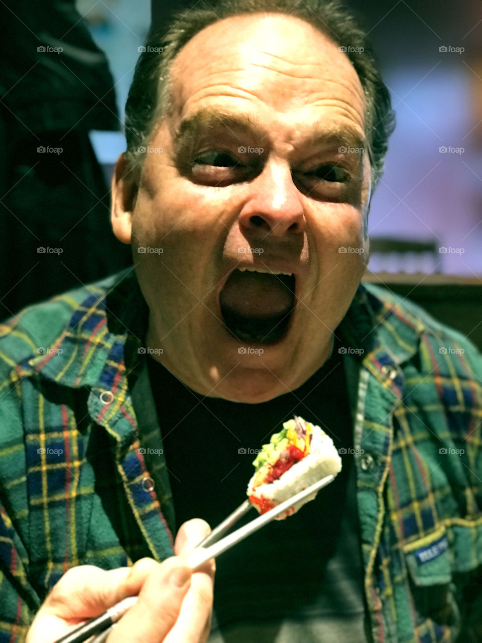 Shot of my husband eating sushi on his birthday. He’s not always the most cooperative subject for my photos and he was really hungry! 🍣