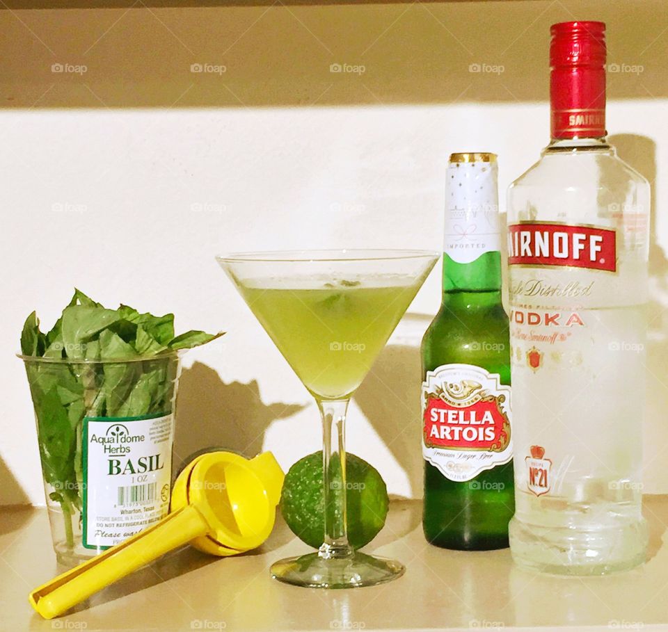 Basil lime vodka martini with a splash of Stella 