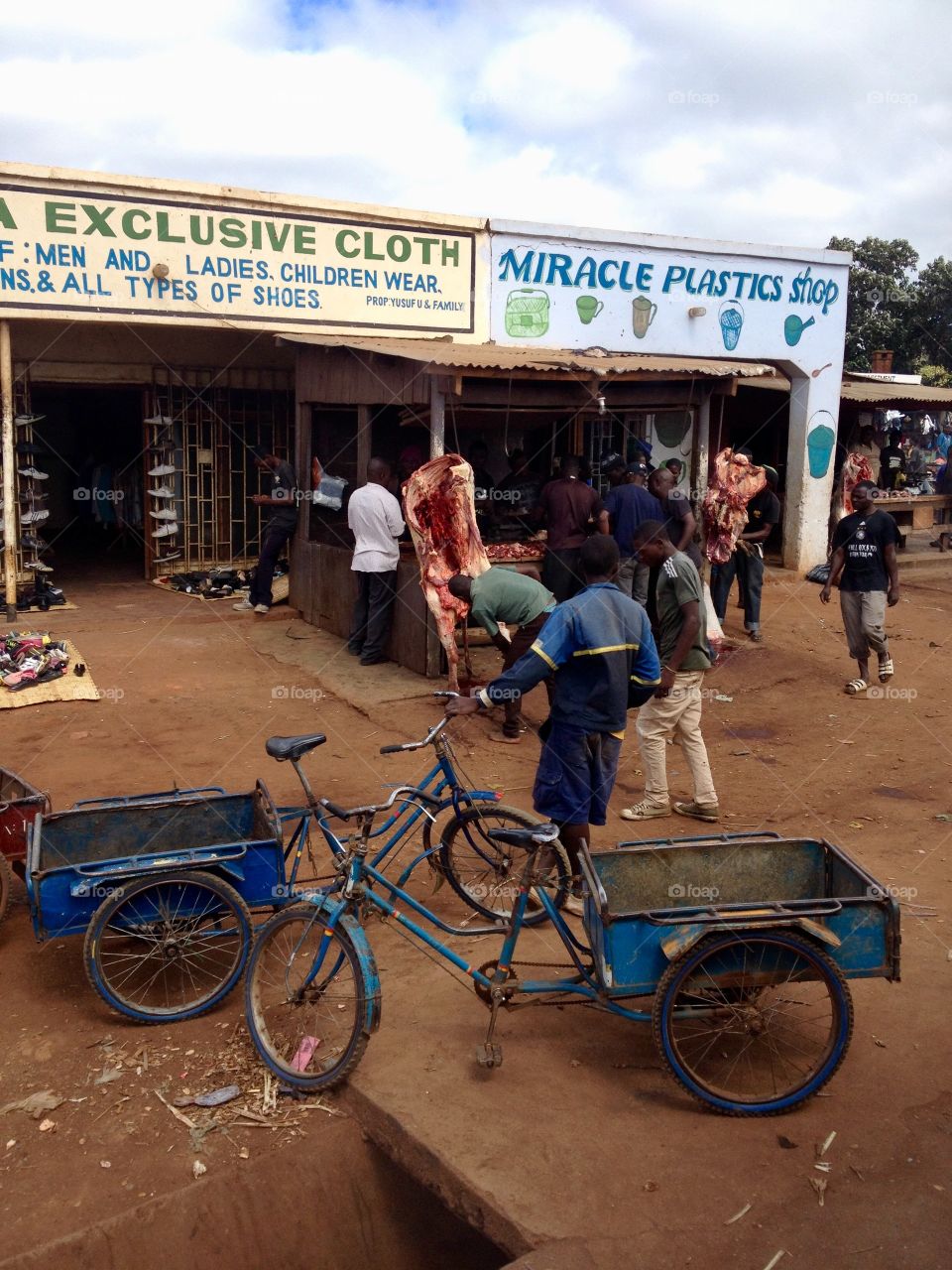 Buying meat at the local market in Malawi.