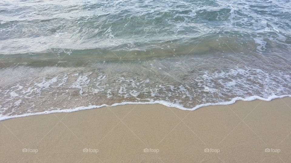 waves on the sand