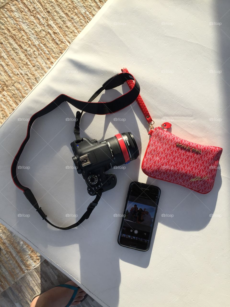 Basic needs for travelling: quality camera, a handy phone and a wallet full of cash!