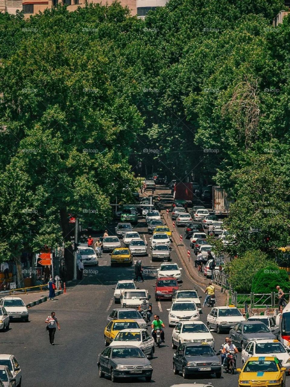 The busy view of the city and the traffic of cars and people is beautiful, as long as you are not stuck in traffic for hours