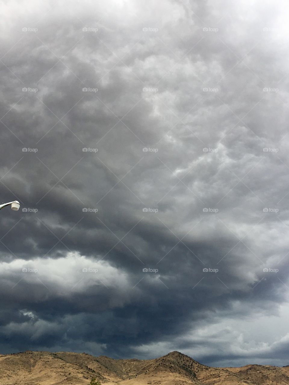 Dark ominous clouds over the high sierras in Nevada 