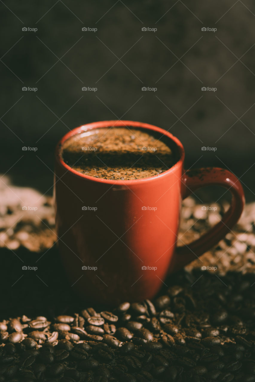 Fresh coffee with red mug