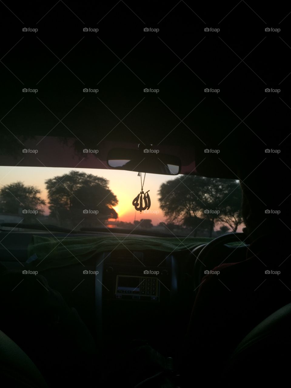 Nice car ride traveling in Pakistan, South Asia, Asia, with beautiful sunset 