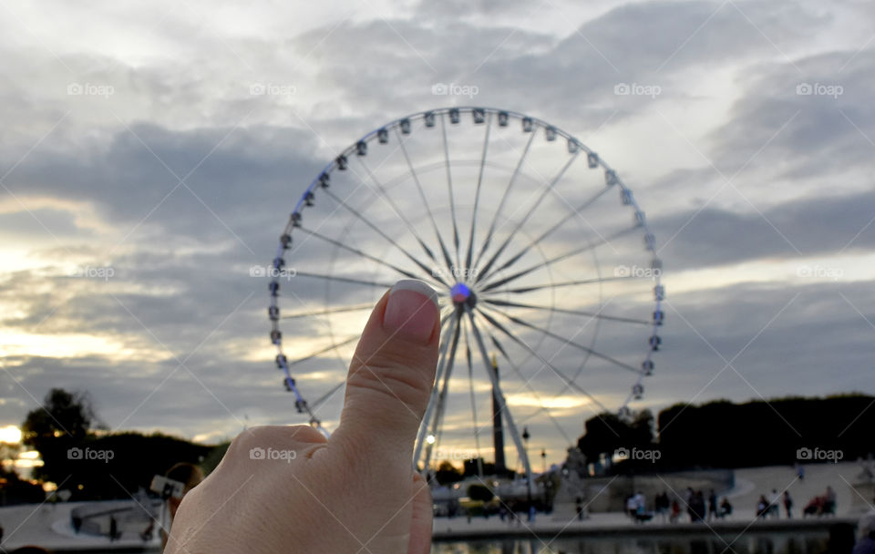 Thumbs up to a carousel in Paris
