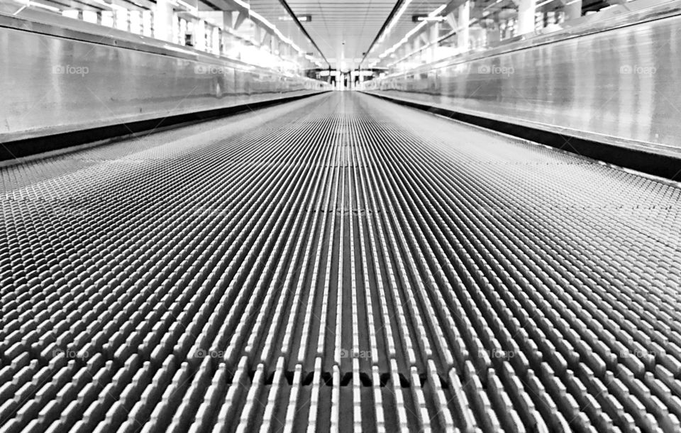 Airport moving walkway low angle view 