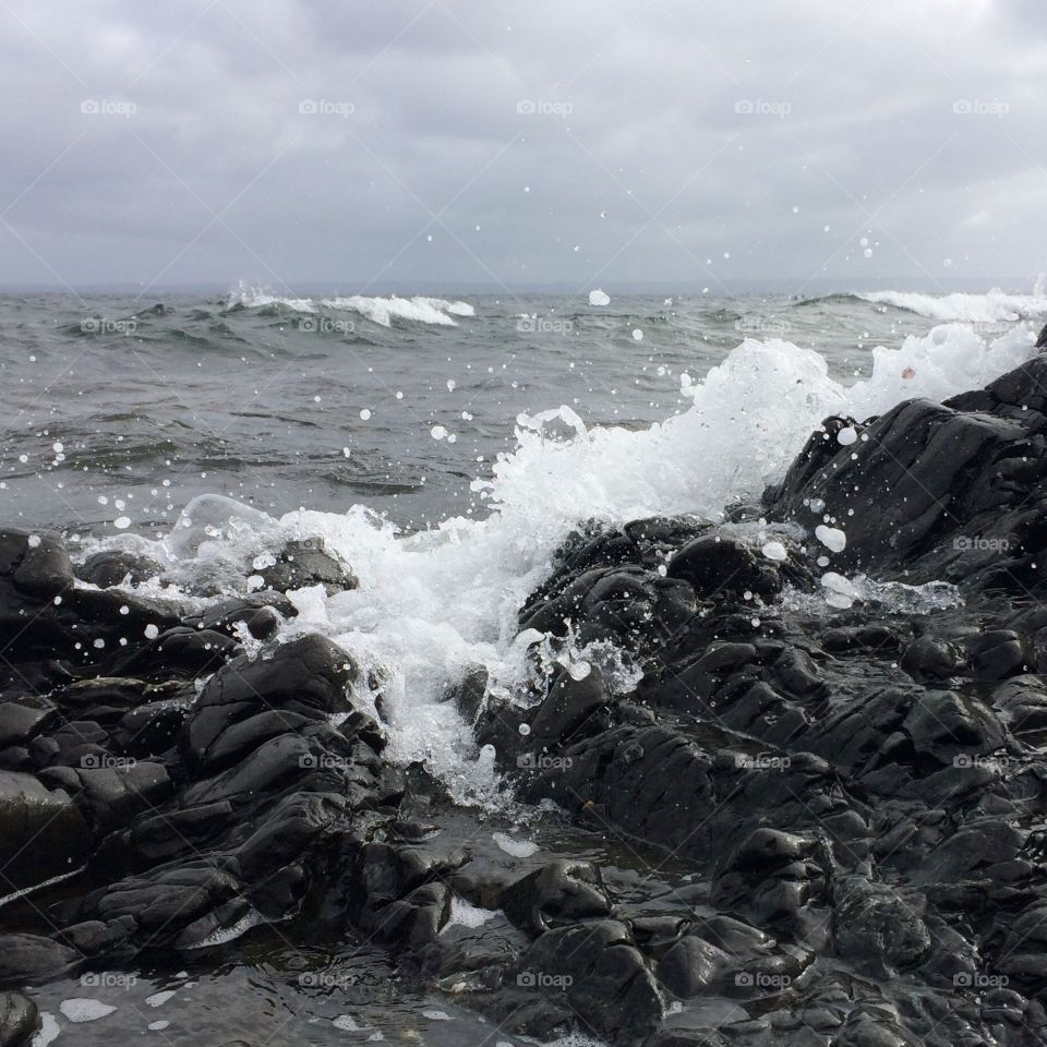 Waves splashing on rocks