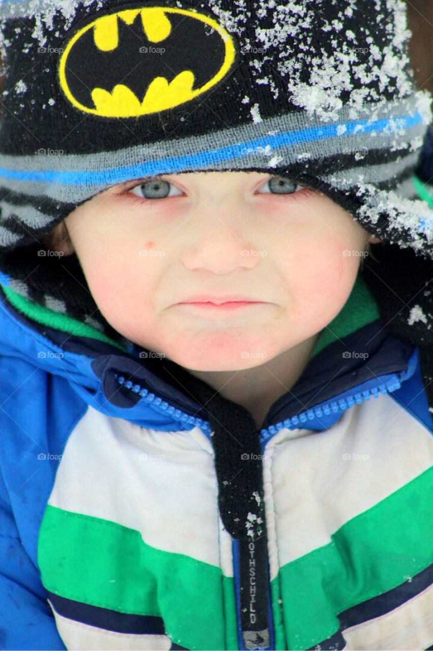 Close-up of a boy in warm clothing