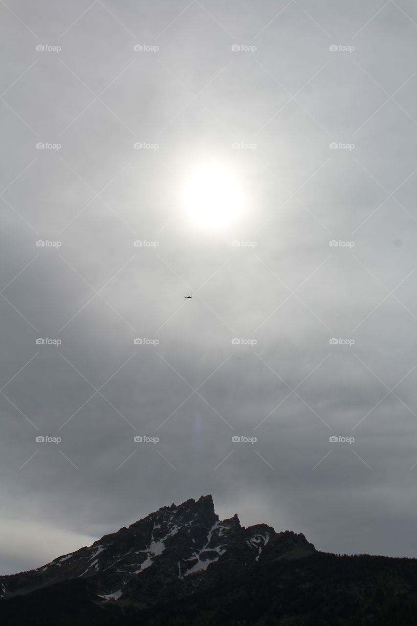 Sky cloud clouds cloudy sun Mountains mountain view helicopter outdoors wilderness