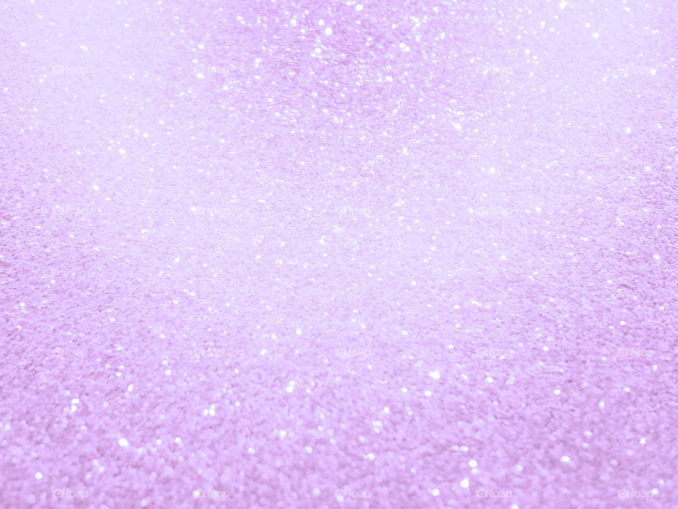 Purple violet glitter texture background. Concept for New Year, Valentines, Christmas, Wedding Anniversary, and Celebration background.
