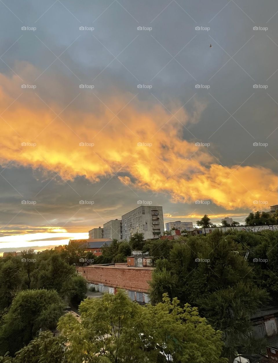 Incredible sunset with orange clouds