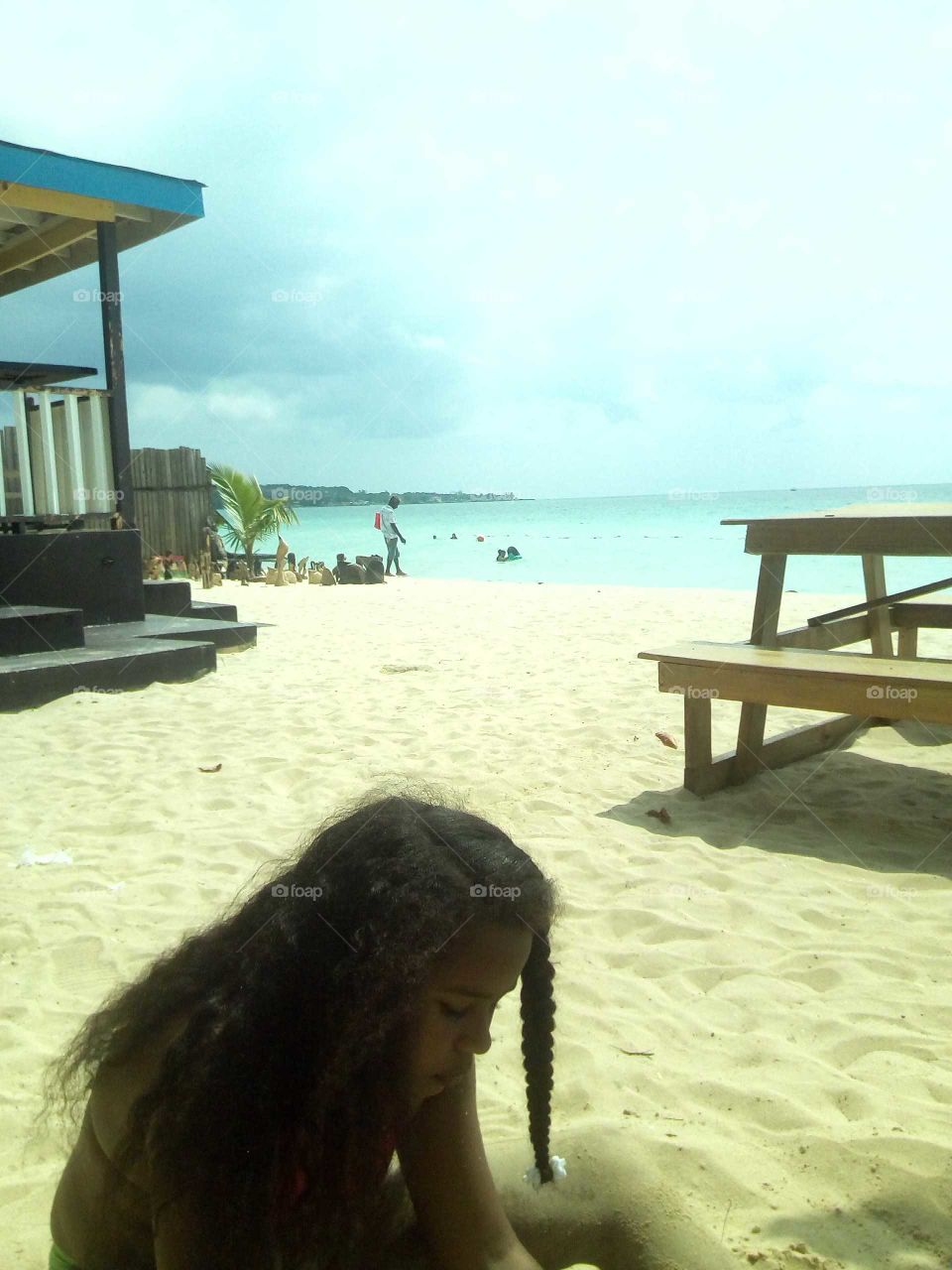 a day off fun on the beach ware you play in the  sand an make sand case an have a sand massage .