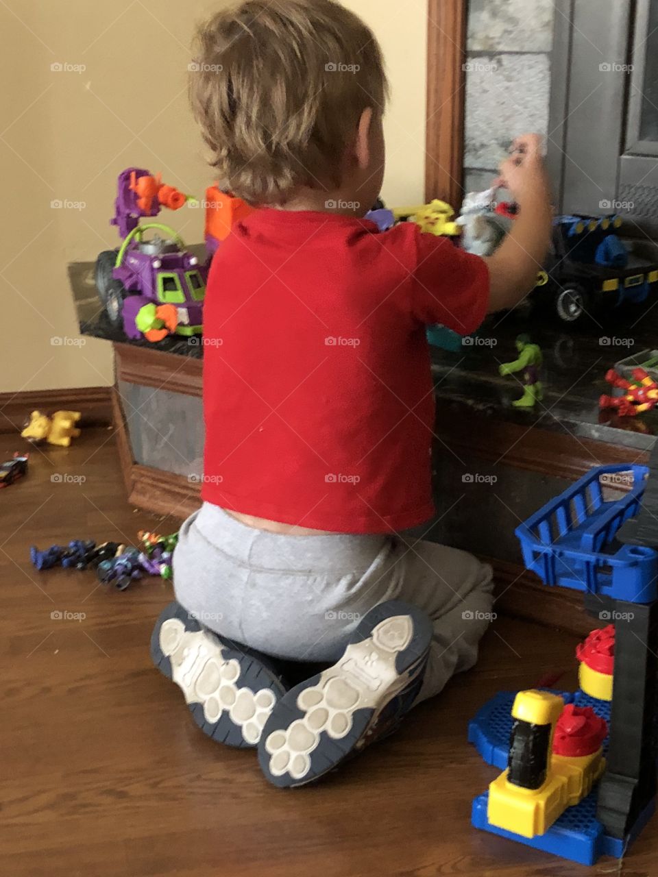 Toddler fun in playing toys