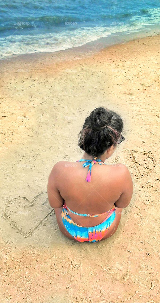 Girl  meditating on the peace of love