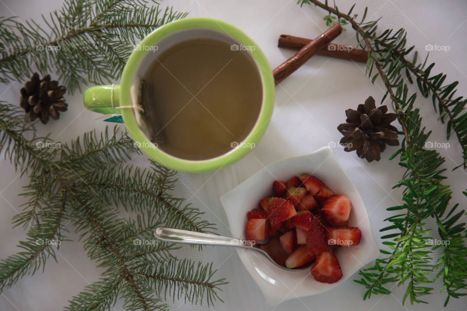 Tea, strawberries and pecan pie in a festive flat lay