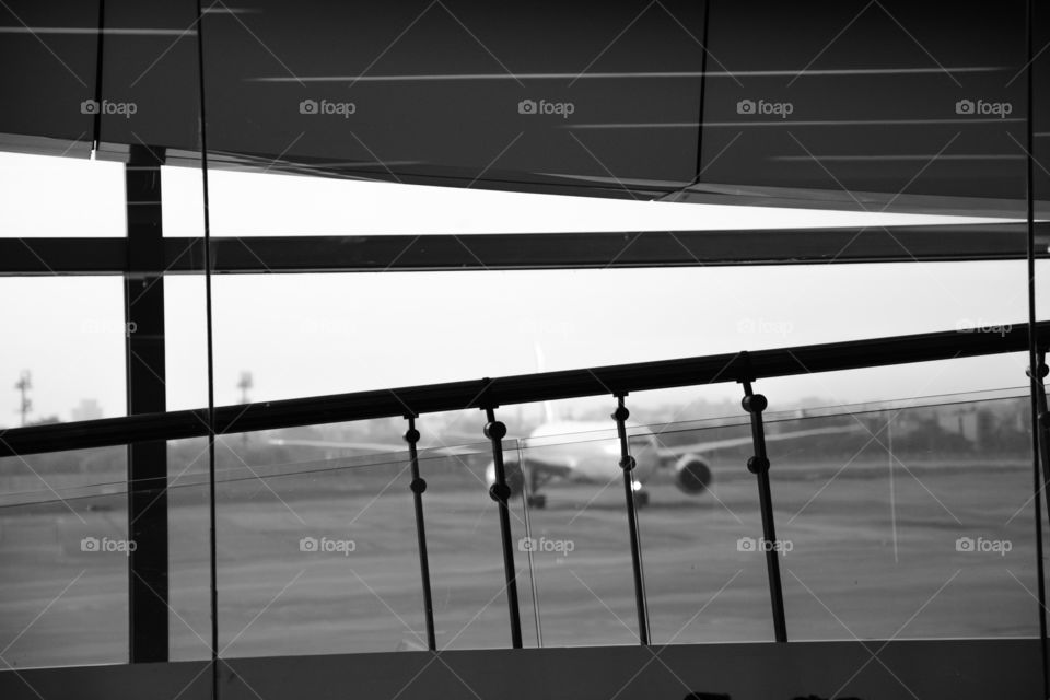 The airport . Clicked at the new delhi international airport. This black and white still is very subtle and deep