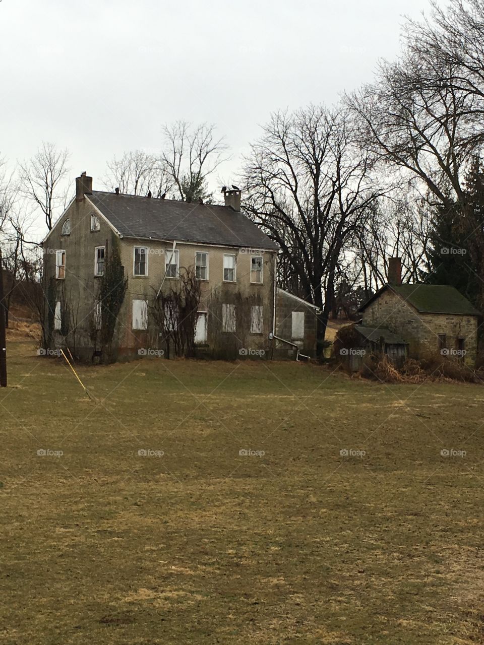 Old abandoned house in the wintertime