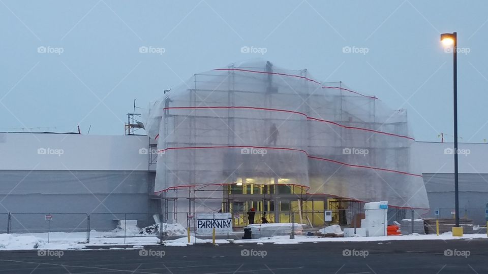 construction under a large tarp