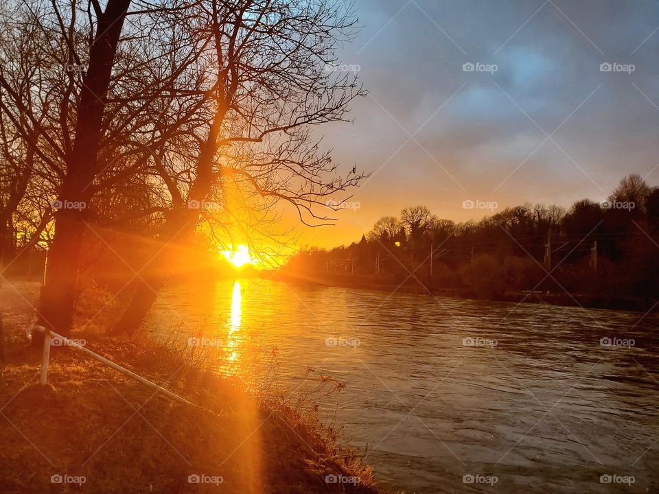 sunset over river