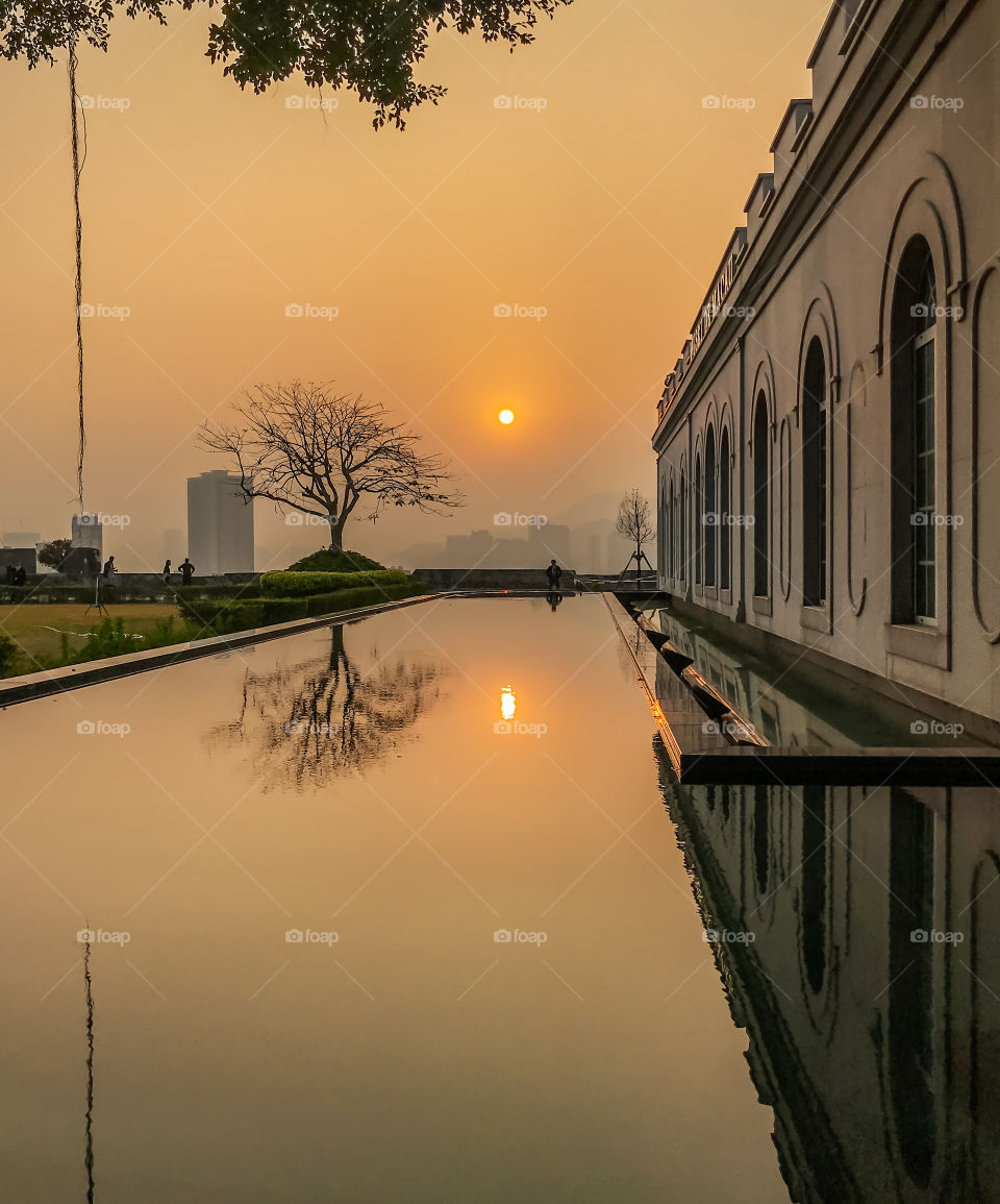 Sunset View and reflections of an Old Museum overlooking the City.