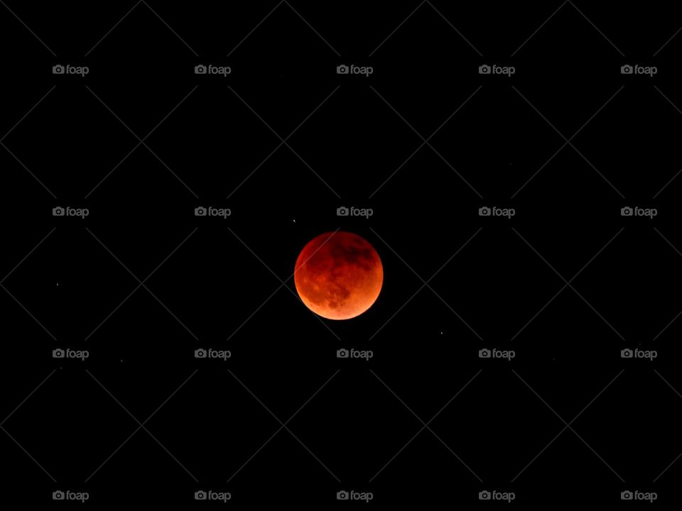 My photos of the Blood Moon, Total lunar eclipse on 15 May 2022 - Lunar eclipses occur when Earth aligns between the sun and the moon and casts a shadow across the lunar surface. The weather condition were very cloudy