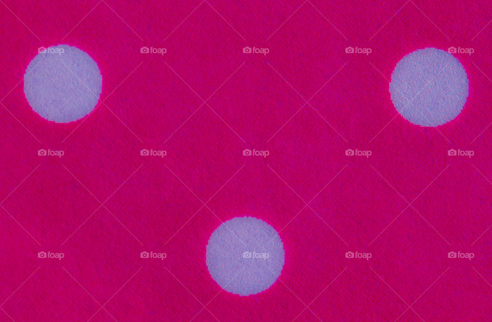 withe circles on pink paper