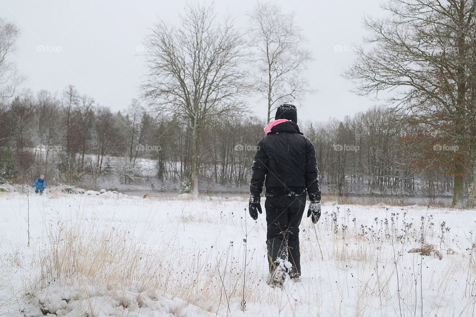 People in winter landscape