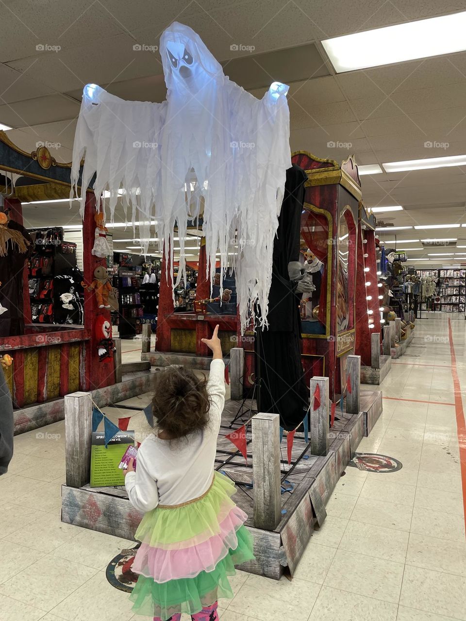 Little girl sees a ghost, scary ghosts everywhere you look, Halloween store antics, having fun in the Spirit Halloween Store, ghosts are real 