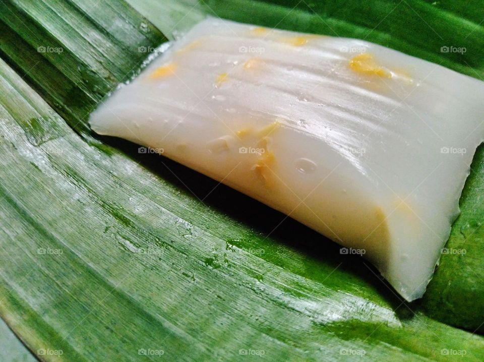 Traditional food from Indonesia nagasari made from rice flour and pieces of jackfruit served on banana leaves
