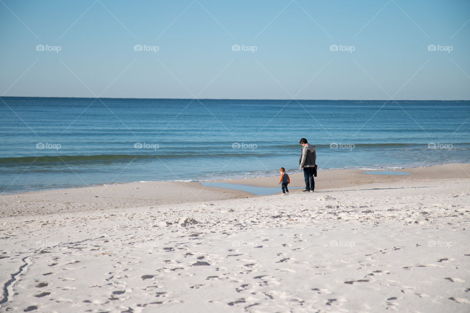 Father and son on the beach