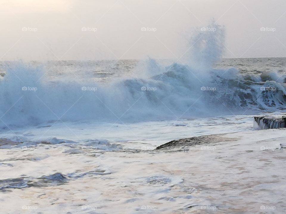 Sea water splashing on a evening
