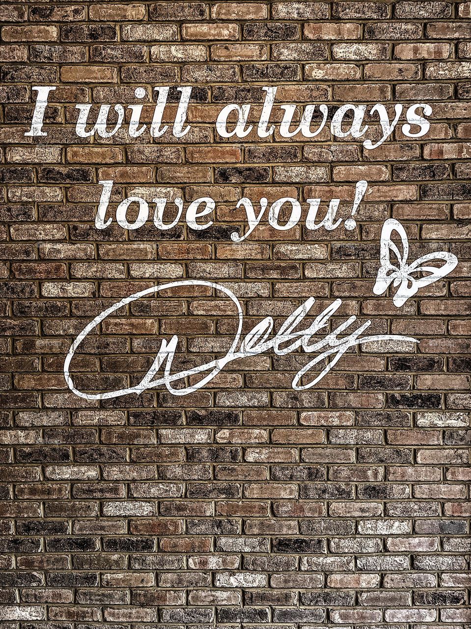 Rectangular brick wall with message from Dolly Parton, rectangular shaped bricks, bricks make a wall, I will always love you message from Dolly Parton, Dollywood theme park, geometric shapes in everyday life, rectangles in life, building blocks