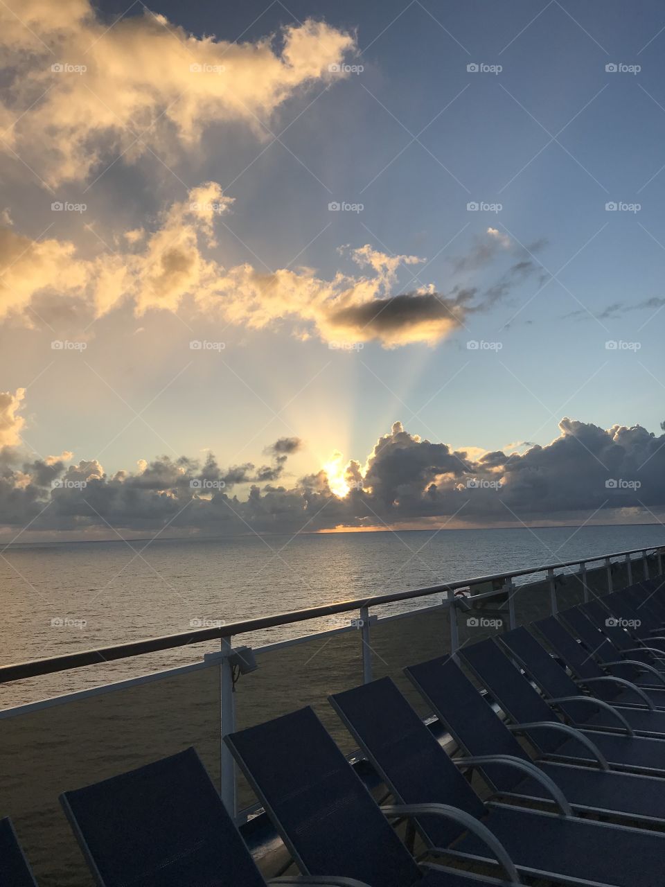 Sun rising ocean cruise ship travel 