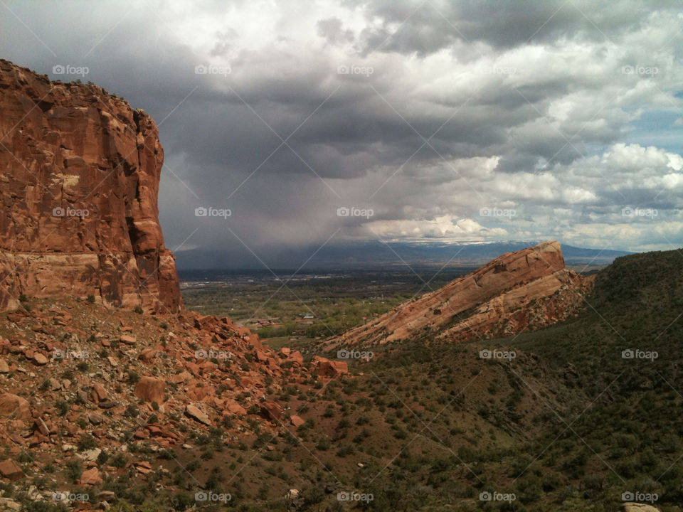 clouds rain monument valley by mcannon