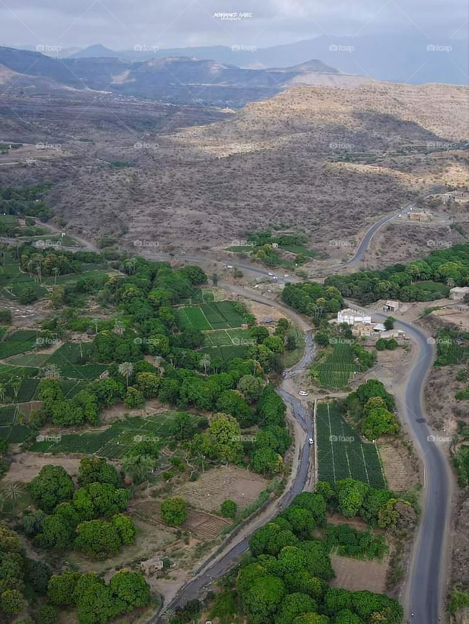 Glory be to God, the magnificent and picturesque view and the natural green trees are a view that is nothing more wonderful than it
