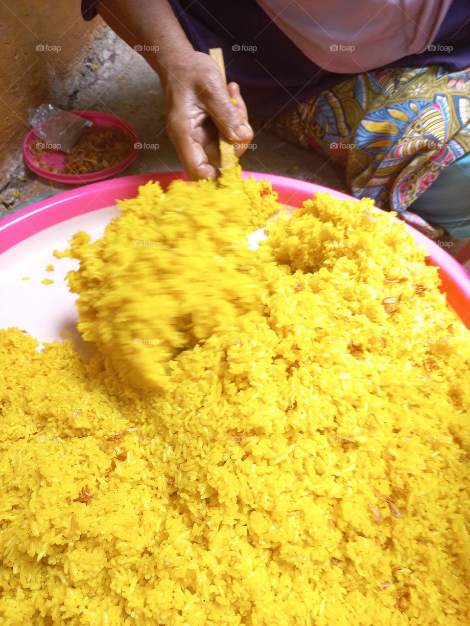 This dish is made from rice cooked together with turmeric and coconut milk and spices