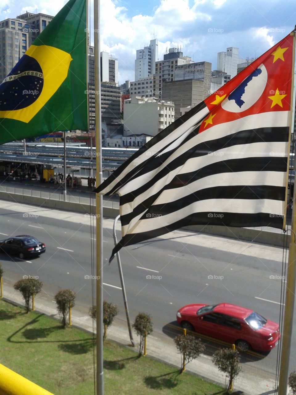 Flags. 
Brazilian flag and the flag of São Paulo on the way to bus terminal Mercado - downtown.