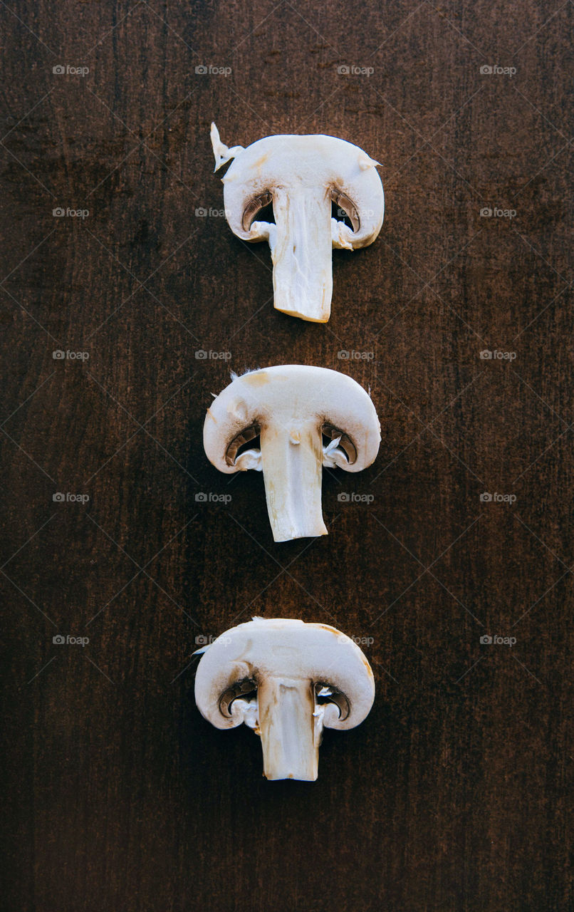 Close-up of mushroom in a row