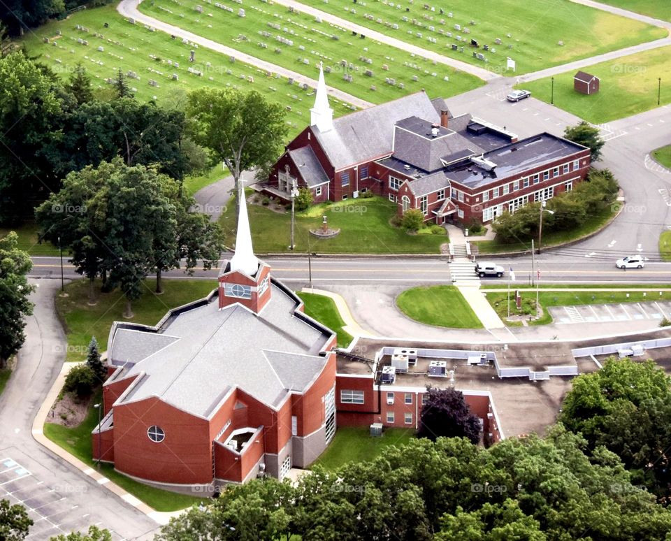 Two large churches across the street from one another 