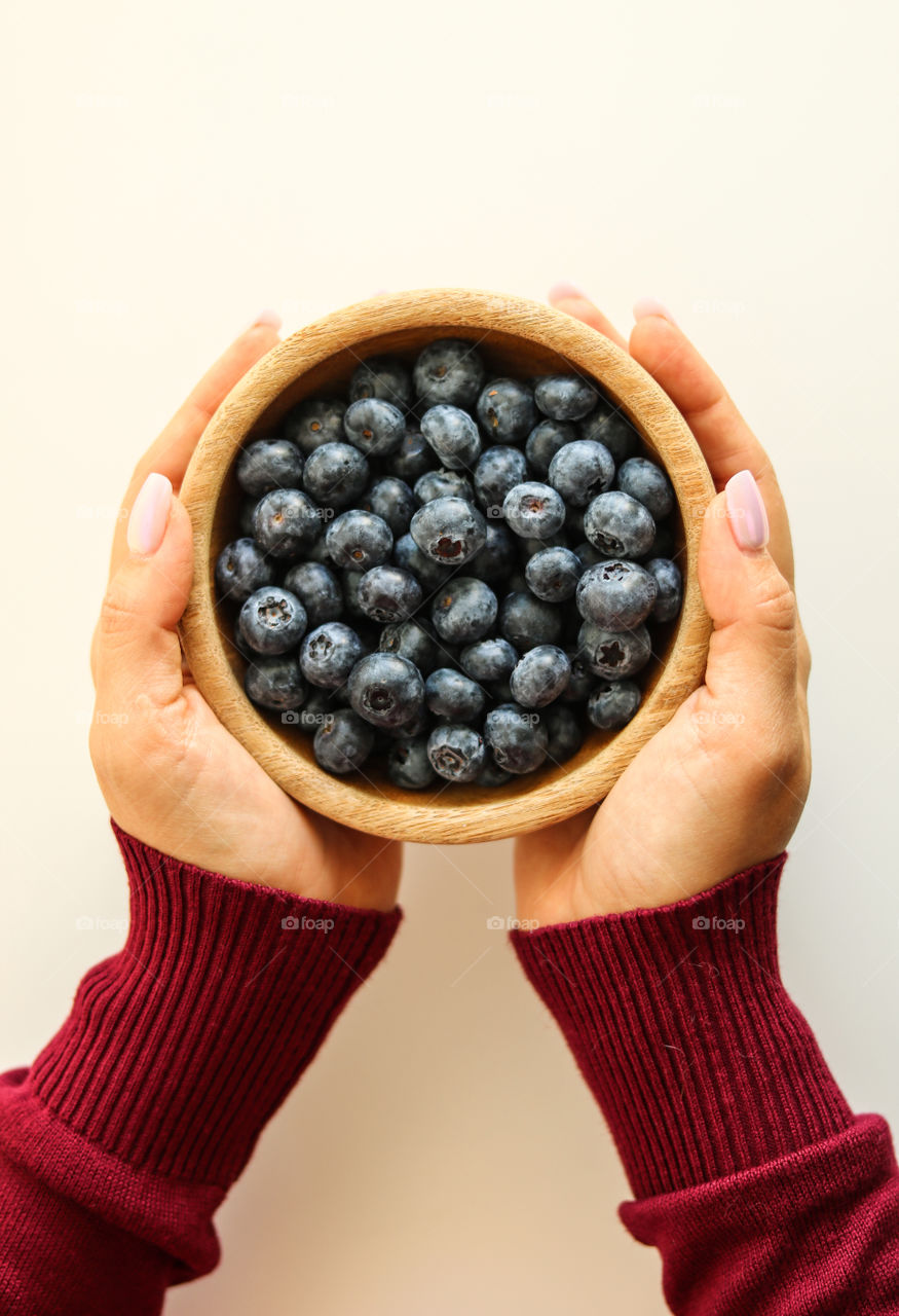 holding Blueberries